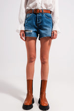 High Waisted Ripped Denim Shorts in Mid Wash