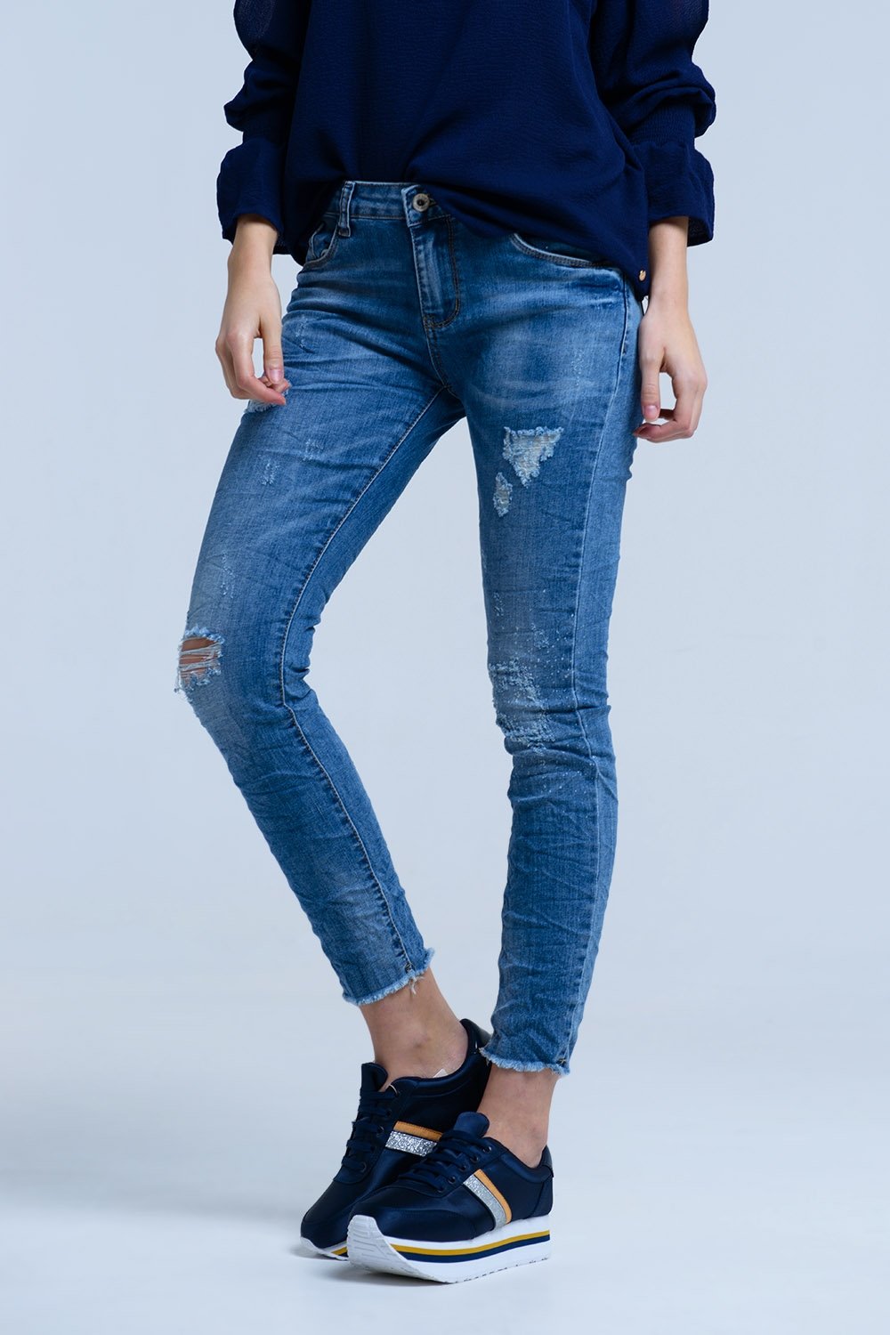 Jeans With Rips Details