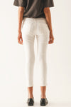 Exposed Buttons Skinny Jeans in Cream